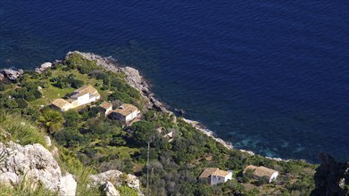 Coastline, houses, red tiled roofs, dark blue sea, Zingaro, national park, nature reserve,