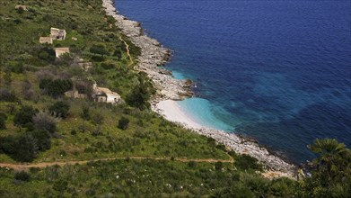 Coastline, turquoise bay, small pebble beach, houses, Zingaro, national park, nature reserve,