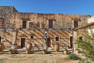 Residential building, doors, windows, vine arbour, Pithoi, Arkadi, Orthodox Monastery, National