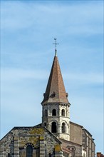 Ennezat. Bell Tower of the Saint-Victor-et-Sainte-Couronne collegiate church. Puy de Dome