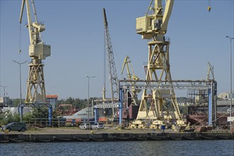 Cranes, old shipyard Stocznia Szczecinska Wulkan, Szczecin, West Pomeranian Voivodeship, Poland,