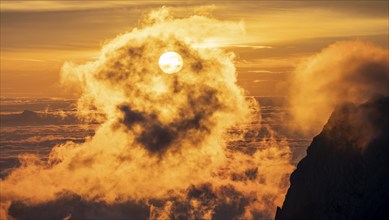 Sunrise, sun shining over mountains in fog, Säntis, Appenzell Ausserrhoden, Appenzell Alps,