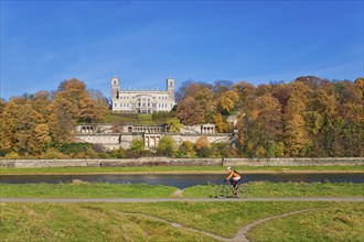 Cyclist in front of Albrechtsberg Castle