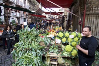 Vegetable stall, vegetables in pile, narrow market alley, vendors, markets, open air, Palermo,