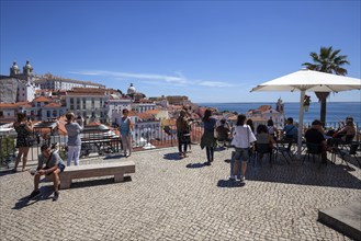 Miradouro Santa Luzia with a view of the historic centre of Lisbon, at the back left the monastery