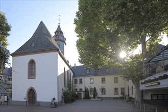 Wilhelmiten monastery with St. Wilhelm church or Annakirche in the backlight, old town, Limburg,