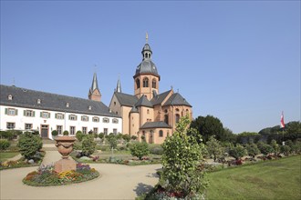 Garden with Einhard Basilica of St. Marcellinus and Peter, monastery complex, Seligenstadt, Main,