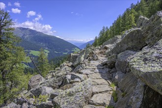 Path through a rocky cirque, hike from Weißbrunnsee to Fiechtalm, Ulten, South Tyrol, Italy, Europe