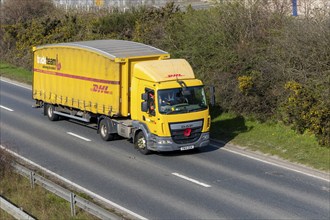 DAF DHL heavy goods vehicle, A12, Suffolk, England, UK