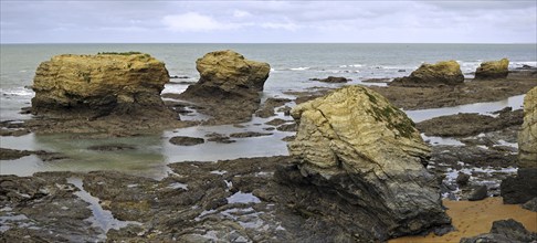 Sea stacks at the Plage des Cinq Pineaux at Saint-Hilaire-de-Riez, La Vendée, Pays de la Loire,