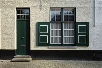 Door and window of an old house, Bruges (Brugge), Belgium, Europe