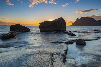 Rocky coast at sunset, Utakleiv, Lofoten, Norway, Europe