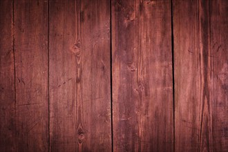 Marsala colored old wood background, wooden planks texture close up