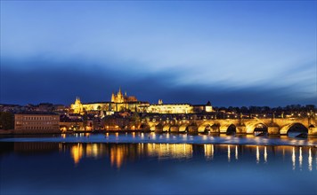 Panorama of Charles Bridge (Karluv most) and Prague Castle in twilight. Prague, Czech Republic,