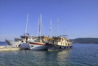 Three ships on the pier, Kucište, Orebic, Pelješac Peninsula, Dubrovnik-Neretva County, Croatia,