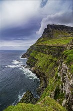 Huge cliffs in Gasadalur, Vagar, Faroe islands, Denmark, Europe