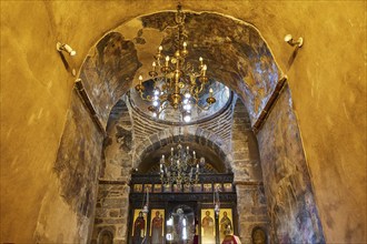 Super wide angle, interior church, icons, tunnel vault, ochre walls, chandelier, altar wall,