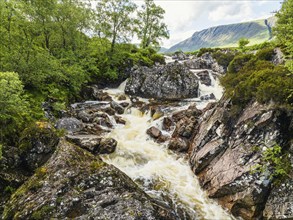 Waterfall on River Coupall from a drone, Buachaille Etive Mor, Glen Etive and River Etive,