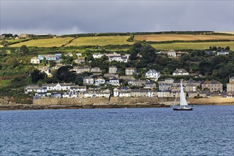 Coastline with fishing village of Mousehole, Penzance, Cornwall, England, United Kingdom, Europe