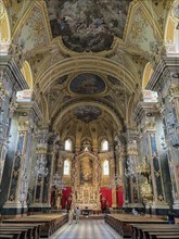 Interior central nave nave above ceiling fresco behind altar of Bressanone Cathedral Bressanone