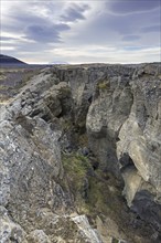 Grjotagia gaping fissure, Grjótagjá tectonic crack, Mid-Atlantic Ridge running through Iceland at