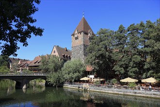 In the historic centre of Nuremberg, houses and restaurant with beer garden on the island of