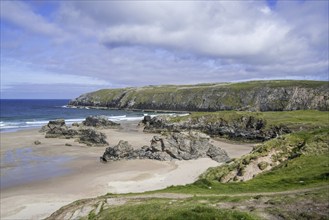 Sandy beach with rocks near Durness, Sutherland, Scottish Highlands, Scotland, UK