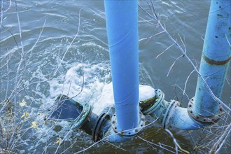 In Dresden, long blue pipelines are used to drain construction pits, pumping out the groundwater