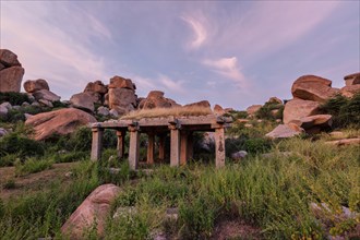 Ancient ruins in Hampi on sunset. Above Hampi Bazaar, Hampi, Karnataka, India, Asia