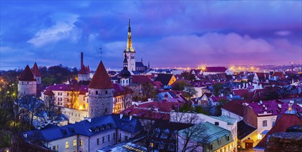 Panorama of aerial view of Tallinn Medieval Old Town with St. Olaf's Church and Tallinn City Wall