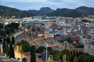 Teatro Romano, blue hour, Roman amphitheater, in the old town of Cartagena, Murcia region, Spain,