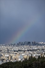 View over the sea of houses of Athens, with rainbow, Athens, Attica, Greece, Europe