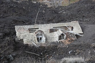 House buried under lava, Sicily, Italy, Europe