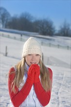 Young woman in winter in Geising