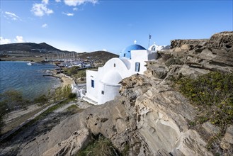 Monastery of Agios Ioannis Detis between rocks on the coast, Paros, Cyclades, Greece, Europe