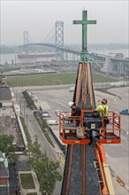 Detroit, Michigan, Workers repair the towers of the Basilica of Ste. Anne de Detroit. Ste. Anne was