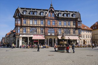 Restaurant and half-timbered house on the market square, Wohltäterbrunnen, Wernigerode, Harz,