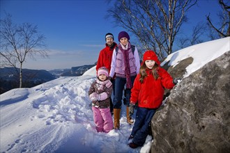 Winter on the Gamrig, a peak in Saxon Switzerland near Rathen. Winter hiking in the national park