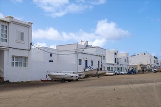 Village street in Caleta de Famara, municipality of Teguise, Lanzarote, Canary Island, Canary