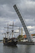 Replica pirate ship excursion boat Lew on the Motlawa, bascule bridge, Gdansk, Pomeranian