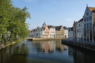 Bruges typical Belgian cityscape Europe tourism concept, canal and old houses and bridge. Brugge,