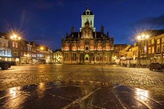 Delft City Hall and Delft Market Square Markt in the evening. Delfth, Netherlands