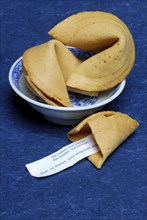 Fortune cookies in bowl, asian lucky charms, surprise, pastry