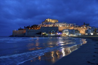 Old town with the Romanesque castle from the 14th century, blue hour, Peñíscola, province