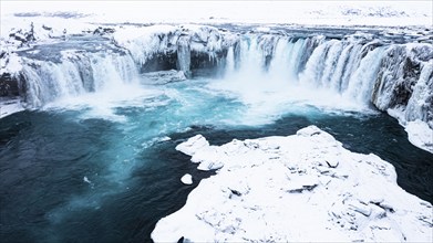 Godafoss waterfall, snowy landscape, drone shot, Northern Iceland Eyestra, Iceland, Europe