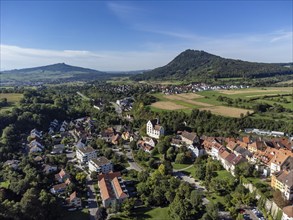 Aerial view of the town of Engen, on the right the Hegau volcano Hohenhewen. on the left the