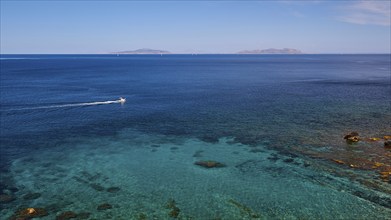 Passing boat, green sea, blue sea, Favignana, Levanzo, Marettimo, Egadi Islands, Sicily, Italy,