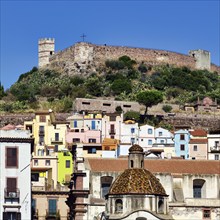 View over colourful houses to Malaspina Castle, old town of Bosa, Oristano, Sardinia, Italy, Europe