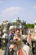 Baroque performers in the Zwinger, the tradition of past festivities and court ceremonies at the