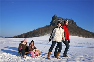 Winter Lilienstein, a peak in Saxon Switzerland. Winter hiking and sledging in the national park is